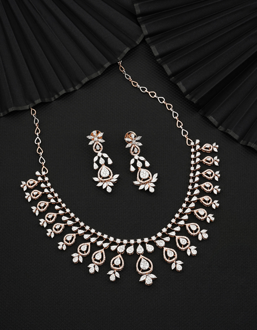 white necklace and earings